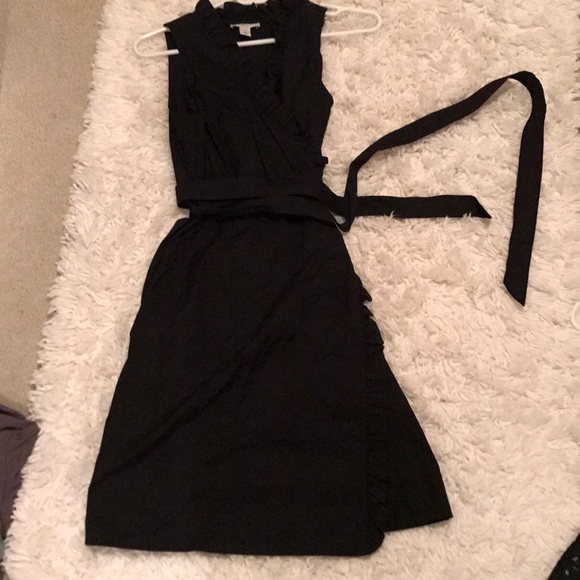 black dress with ruffle collar